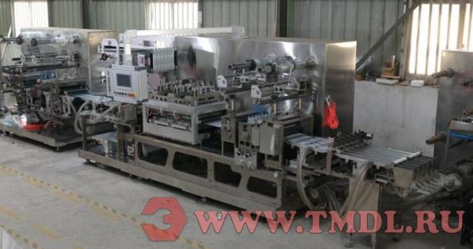 Станок для производства отбеливающих полосок для зубов